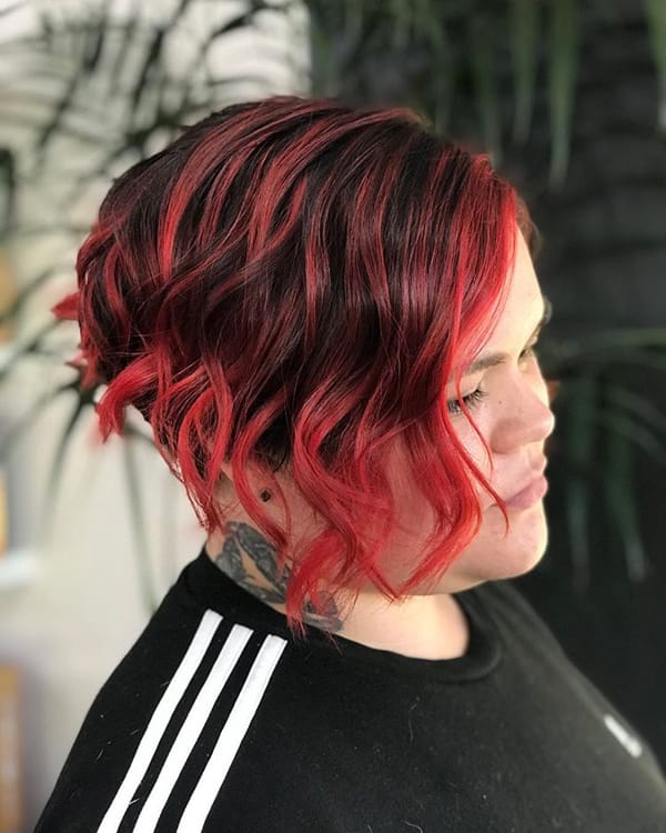 Asymmetrical Short Hairstyle with Red Highlights