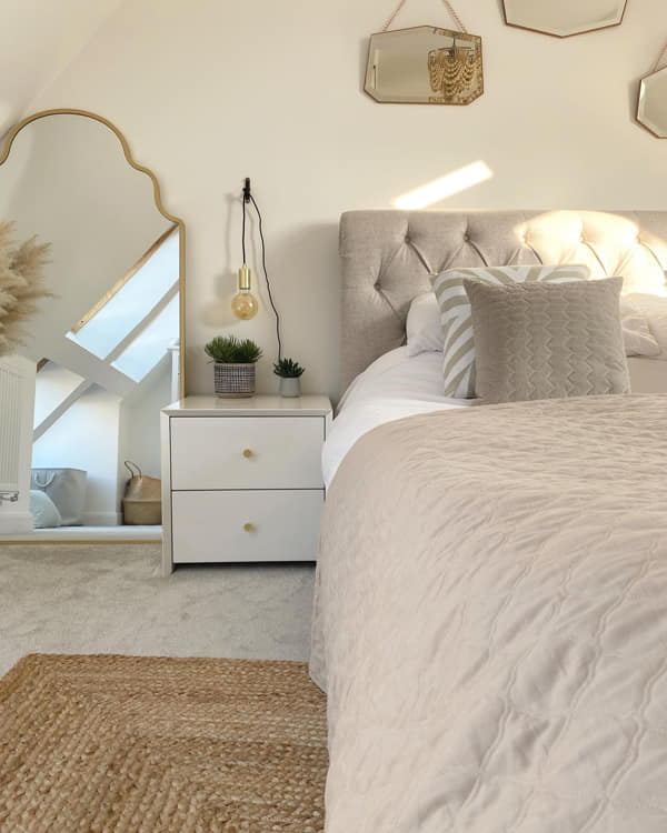 Multiple Uniquely Shaped Mirrors Tall Mirror on Side of the Bed and Smaller Mirrors over Headboard